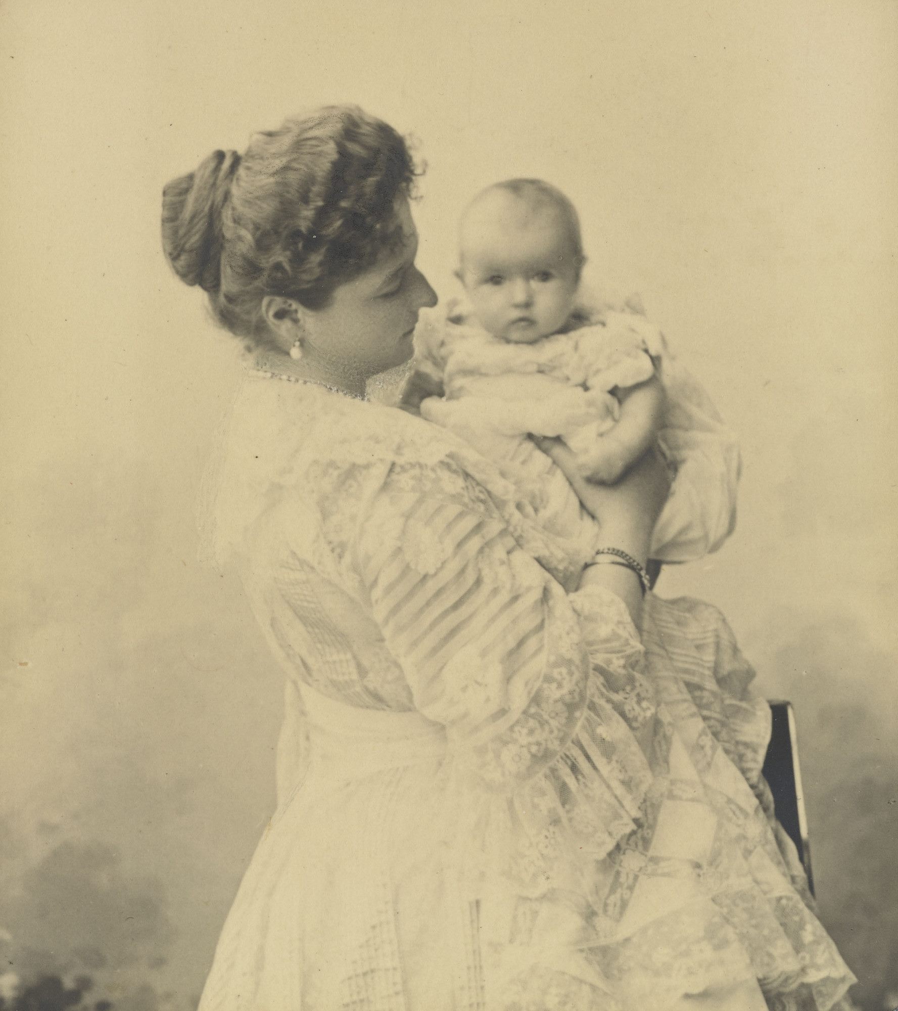 Именем Матери